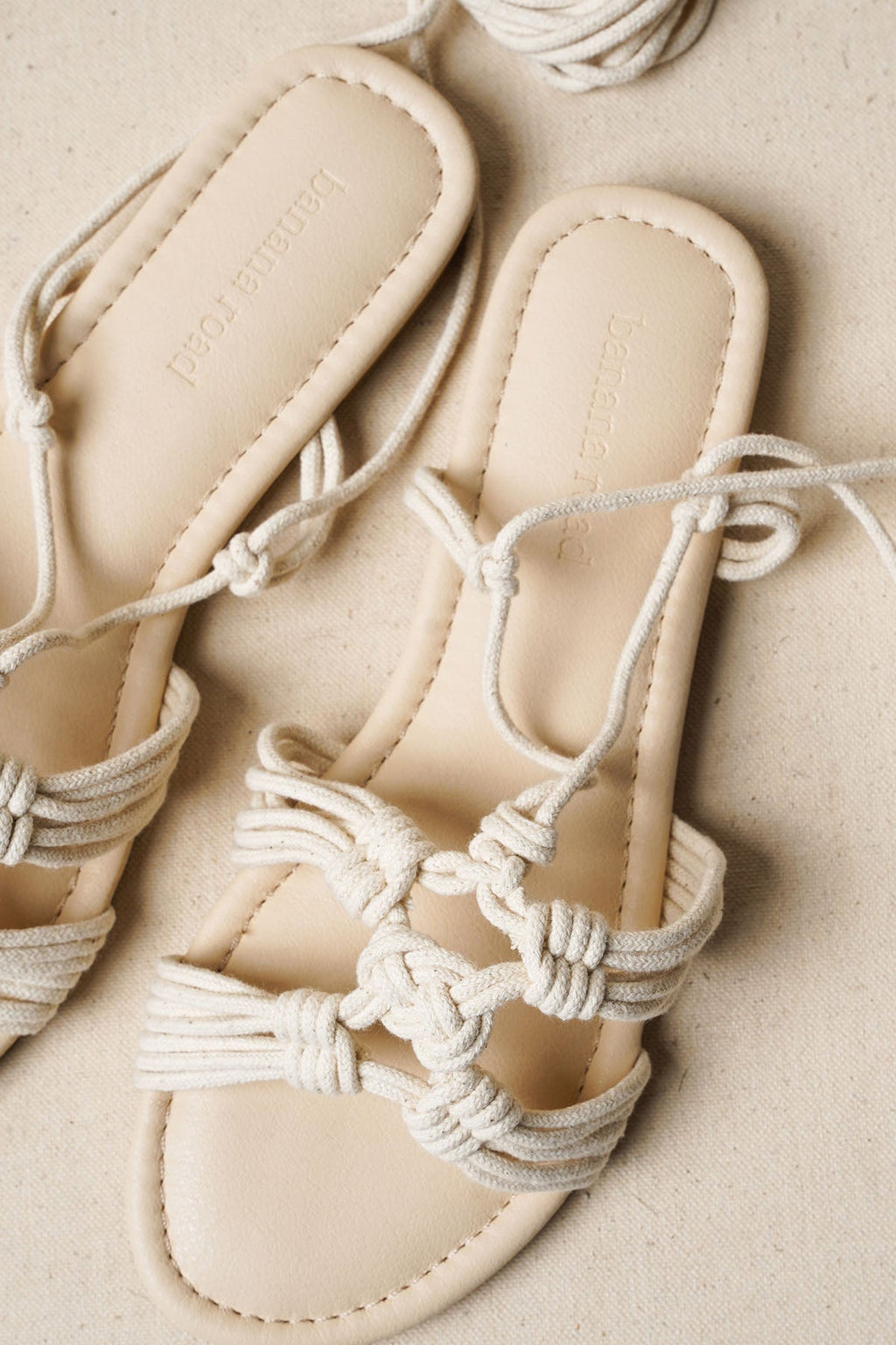 CAPRI WOVEN SLIDES