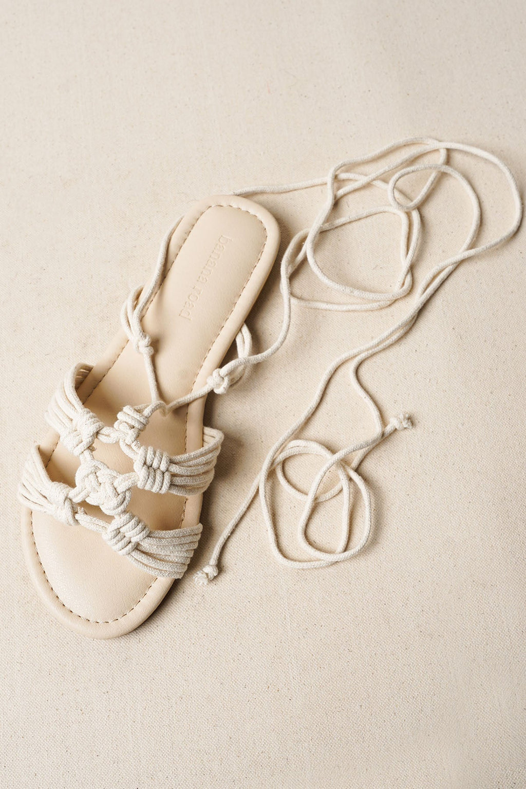 CAPRI WOVEN SLIDES