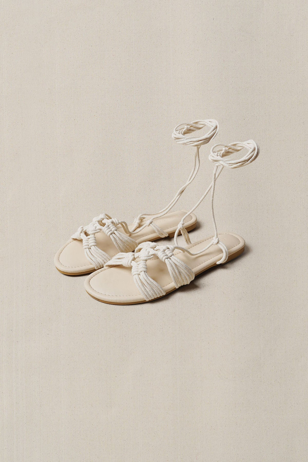 CAPRI WOVEN SLIDES