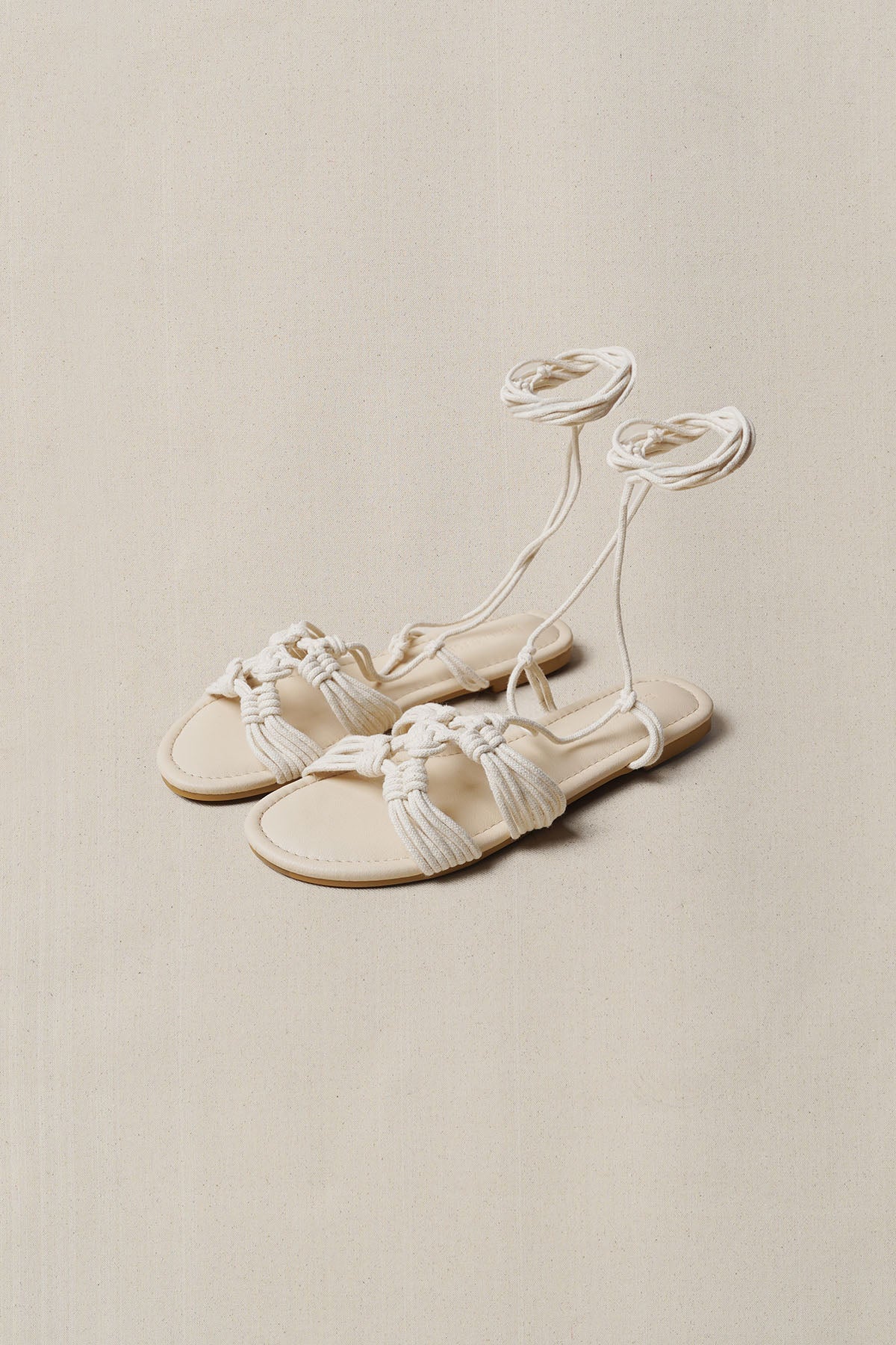 CAPRI WOVEN SLIDES