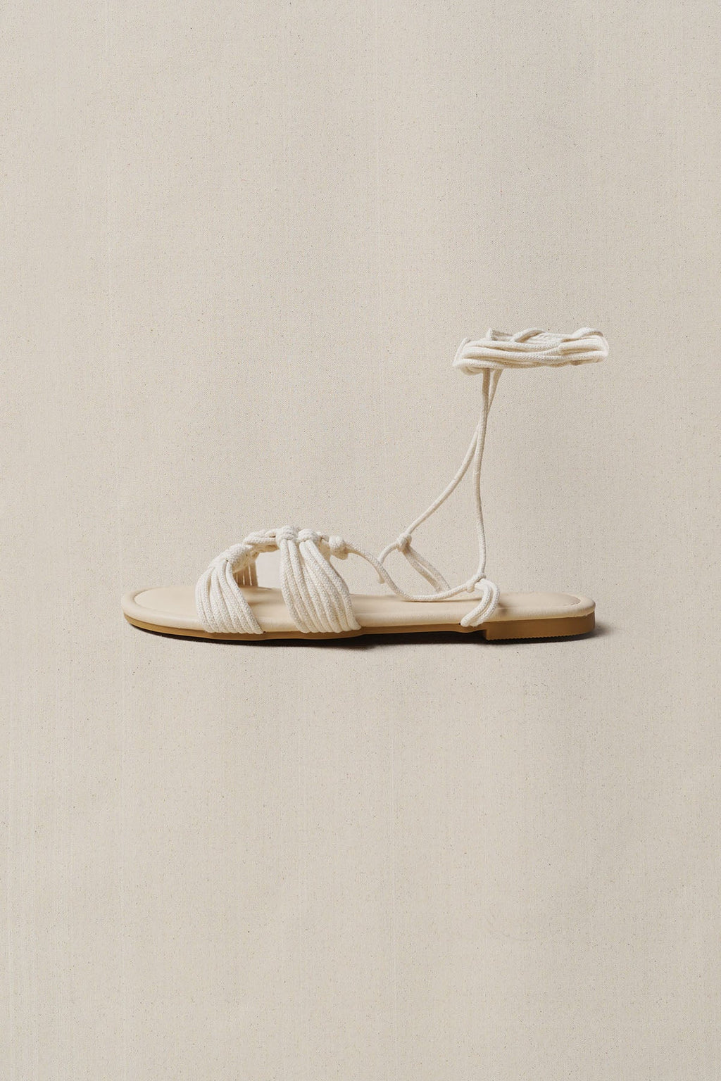 CAPRI WOVEN SLIDES