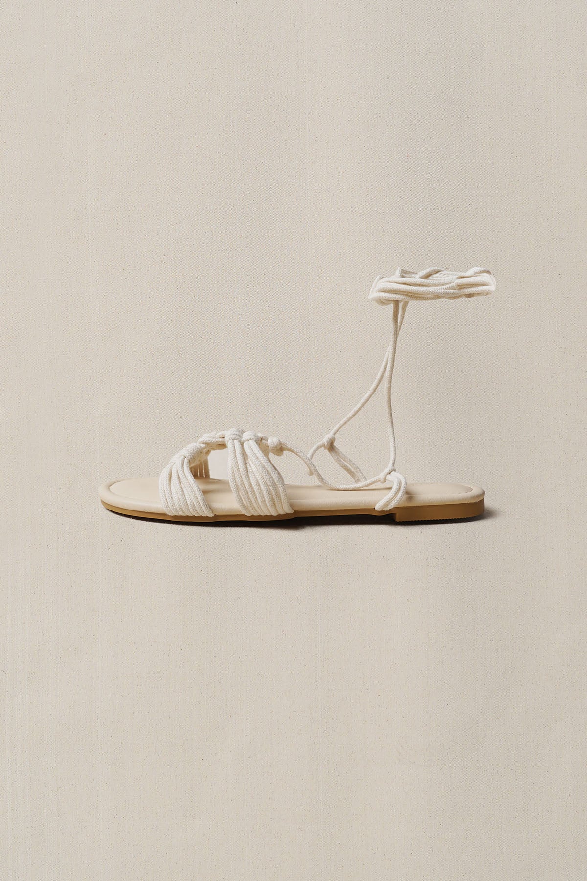 CAPRI WOVEN SLIDES